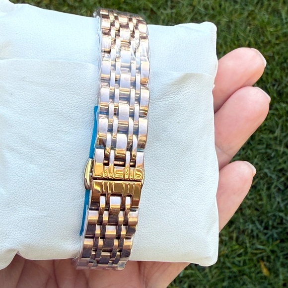 Rose Gold watch with pink watch face and diamond inspired stones around face - Picture 2 of 6